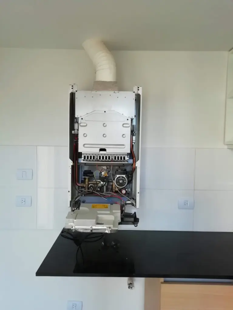 Wall-hung boiler opened up to check its components