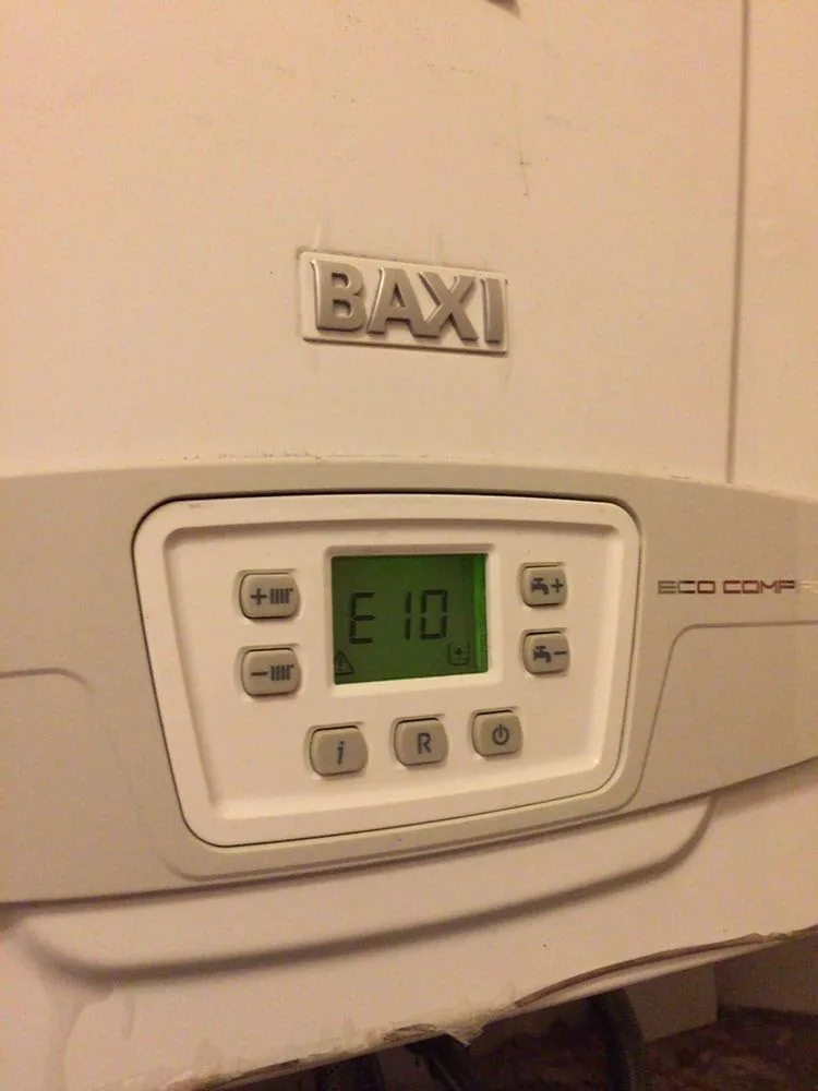 Wall-hung gas boiler with its control display in a home