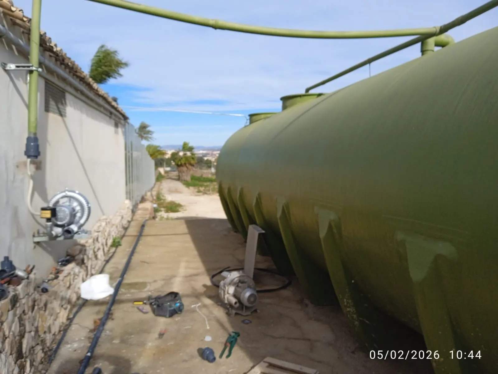 Reserve water tank installed outside a property